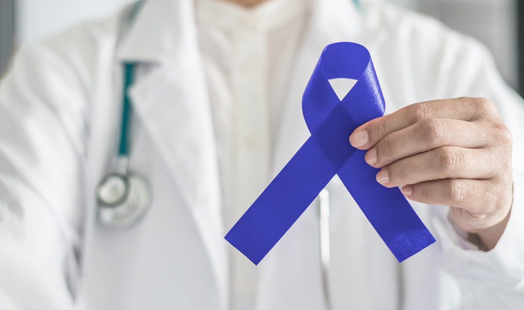doctor with blue ribbon