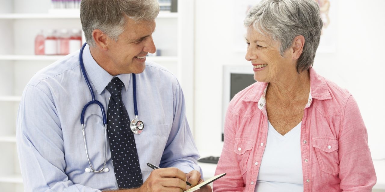 male provider talking to a female patient